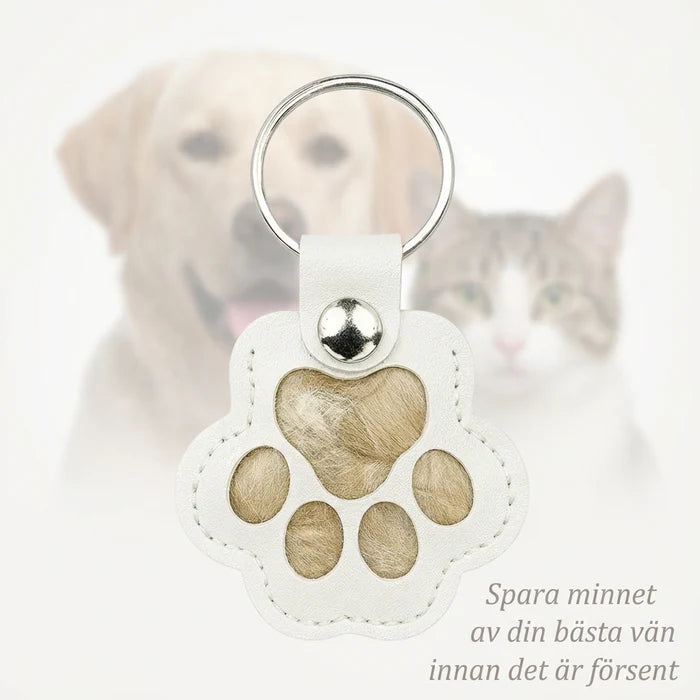 Pote-nøkkelring som lar deg forevige et varmt minne om kjæledyret ditt