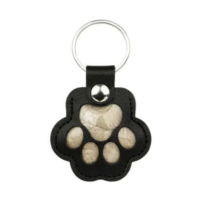 Pote-nøkkelring som lar deg forevige et varmt minne om kjæledyret ditt