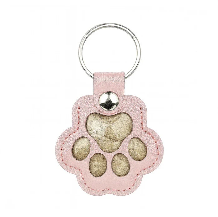 Pote-nøkkelring som lar deg forevige et varmt minne om kjæledyret ditt