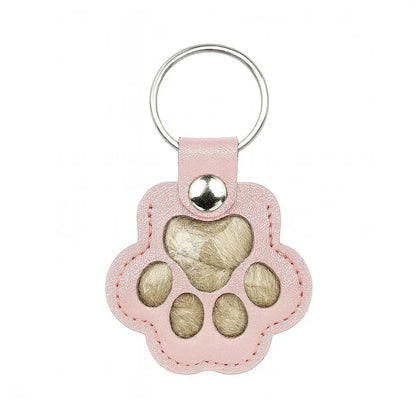 Pote-nøkkelring som lar deg forevige et varmt minne om kjæledyret ditt