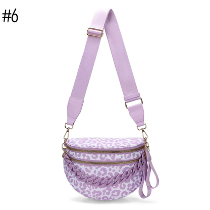 Romslig crossbody-veske med flere lommer