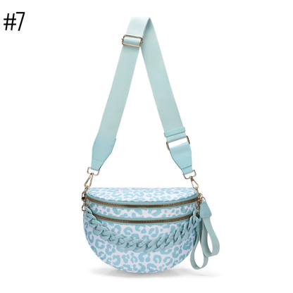 Romslig crossbody-veske med flere lommer