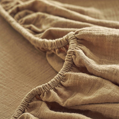 Muslin dra‑på‑lakan